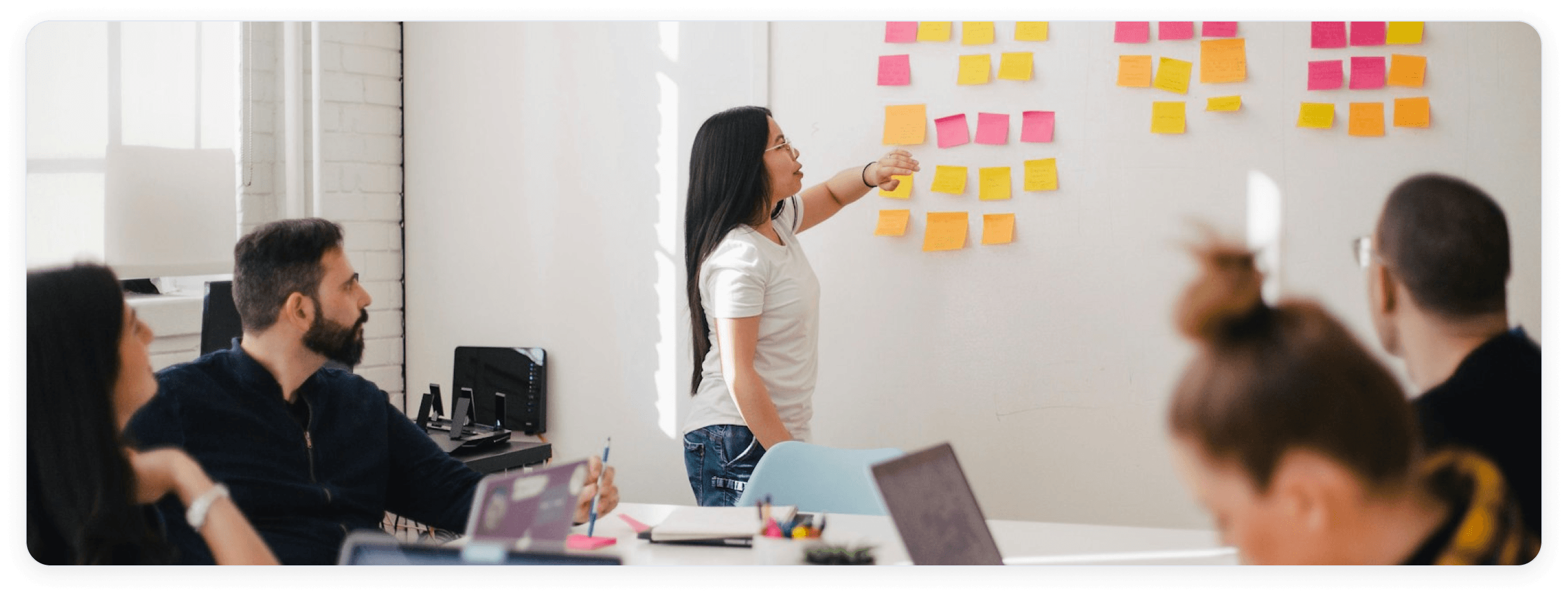 A team member presenting ideas during a collaborative workshop